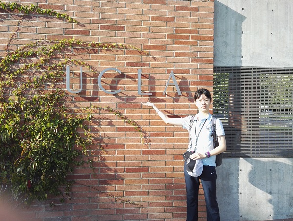 Student with UCLA sign